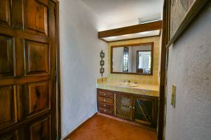 Departamento en venta en Vida del Mar, Manzanillo-planta baja y vista al jardín
