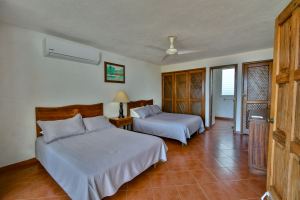 Departamento en venta en Vida del Mar, Manzanillo-planta baja y vista al jardín