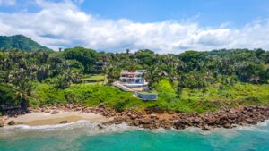 Villa Cormorán | Contemporary colonial elegance by the sea, Litibú