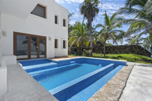 Villa Cormorán | Contemporary colonial elegance by the sea, Litibú