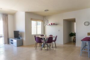 EXCLUSIVE 2-BEDROOM CONDO JUST STEPS FROM THE BEACH