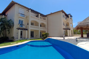 EXCLUSIVE 2-BEDROOM CONDO JUST STEPS FROM THE BEACH