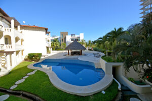 EXCLUSIVE 2-BEDROOM CONDO JUST STEPS FROM THE BEACH