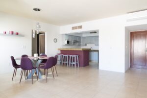 EXCLUSIVE 2-BEDROOM CONDO JUST STEPS FROM THE BEACH