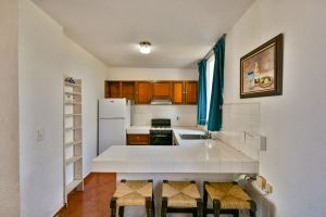 Departamento en venta en Vida del Mar, Manzanillo-planta baja y vista al jardín