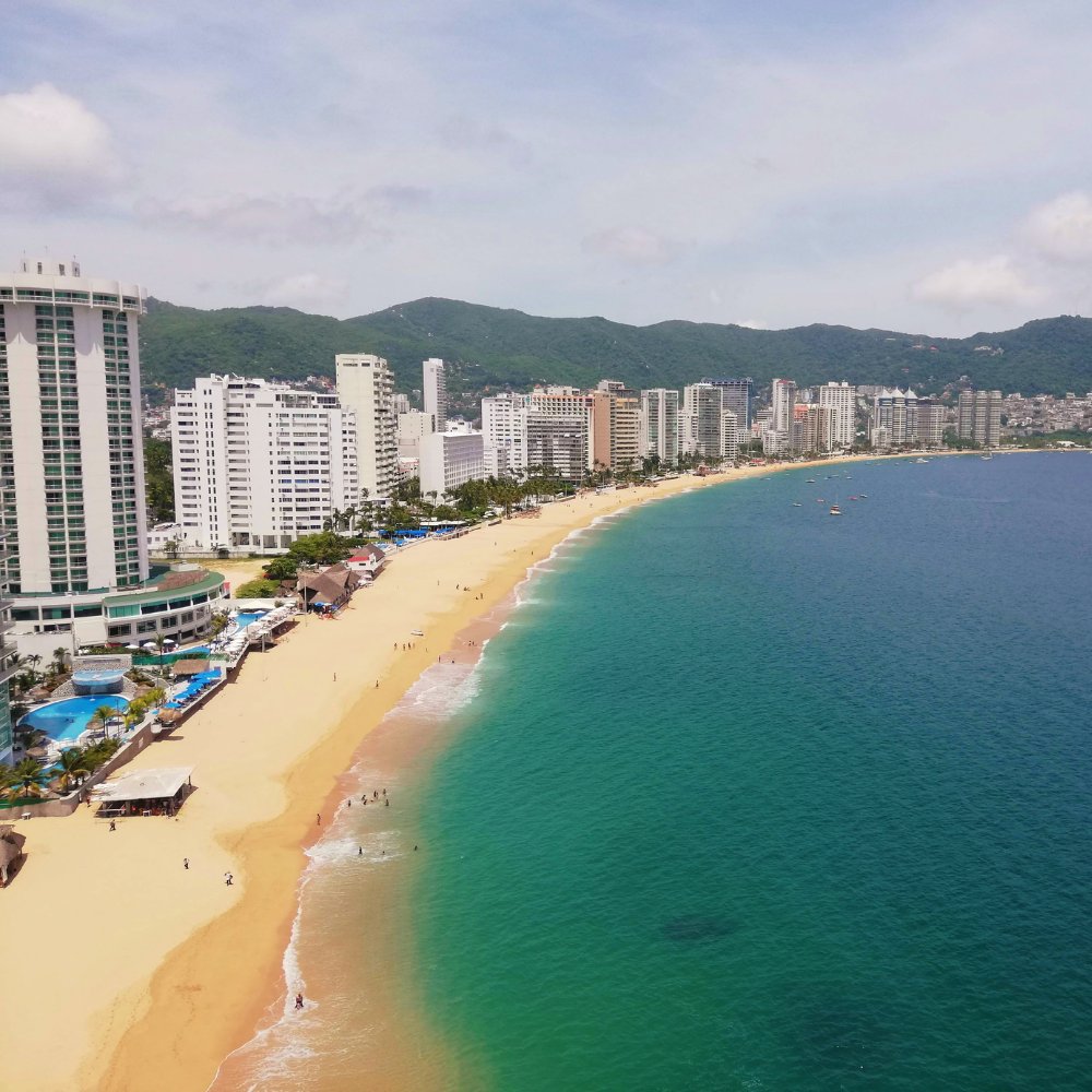 Aerial view of the beachfront hotel strip and bay, Puerto Vallarta