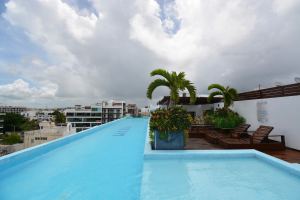 ONE BEDROOM IN THE CARIBBEAN A FEW STEPS FROM THE SEA