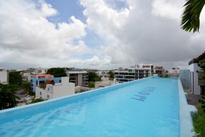 ONE BEDROOM IN THE CARIBBEAN A FEW STEPS FROM THE SEA