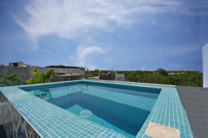 Quinto Sol | Loft Style Condo in Aldea Zama