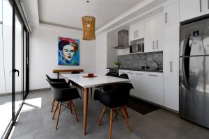 Quinto Sol | Loft Style Condo in Aldea Zama