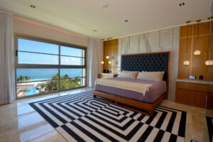 IMPRESSIVE BEACHFRONT PENTHOUSE WITH ICONIC ART