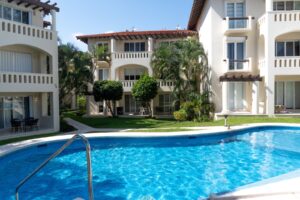 EXCLUSIVE 2-BEDROOM CONDO JUST STEPS FROM THE BEACH