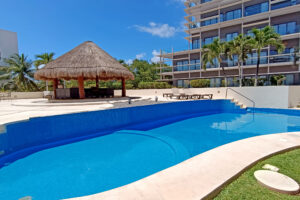 EXCLUSIVE 2-BEDROOM CONDO JUST STEPS FROM THE BEACH