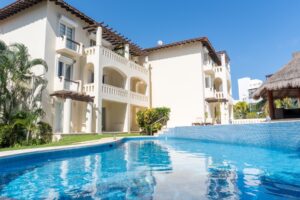 EXCLUSIVE 2-BEDROOM CONDO JUST STEPS FROM THE BEACH