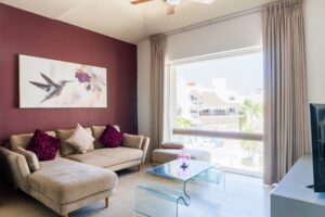 EXCLUSIVE 2-BEDROOM CONDO JUST STEPS FROM THE BEACH
