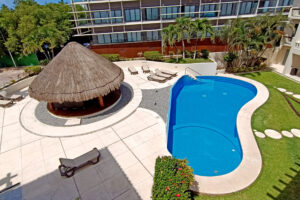 EXCLUSIVE 2-BEDROOM CONDO JUST STEPS FROM THE BEACH