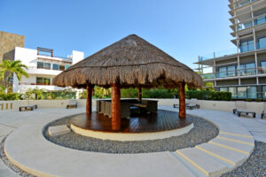 EXCLUSIVE 2-BEDROOM CONDO JUST STEPS FROM THE BEACH