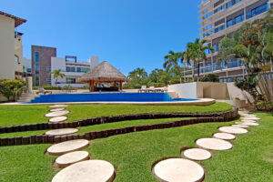 EXCLUSIVE 2-BEDROOM CONDO JUST STEPS FROM THE BEACH