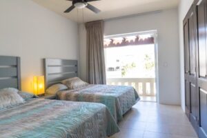 EXCLUSIVE 2-BEDROOM CONDO JUST STEPS FROM THE BEACH