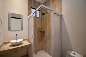 Comfort and Convenience in an Expansive Three-Bedroom Residence