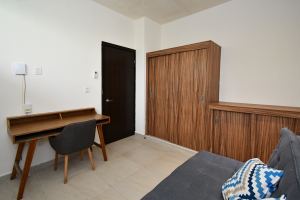 Comfort and Convenience in an Expansive Three-Bedroom Residence
