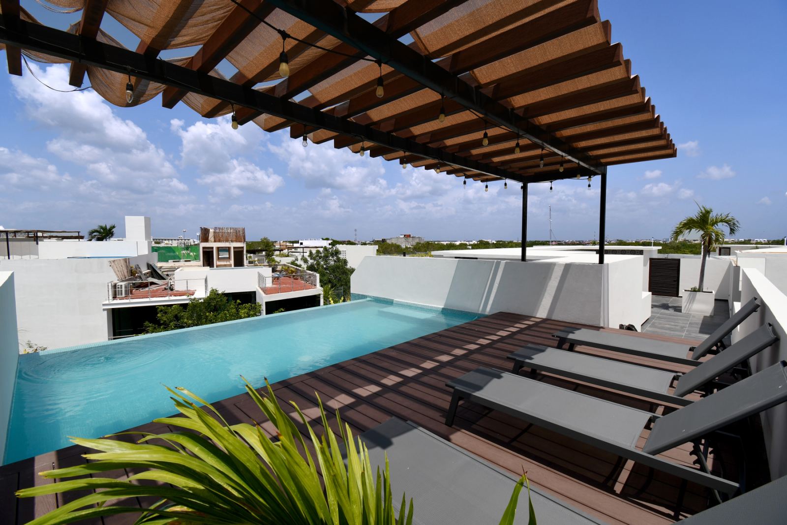 Quinto Sol | Loft Style Condo in Aldea Zama